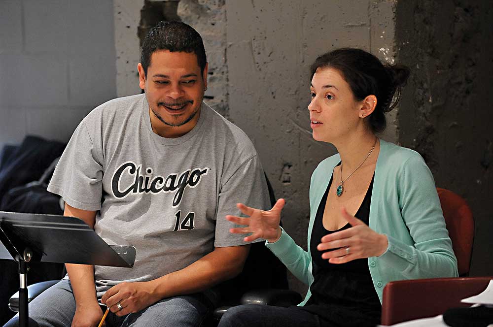 Director Edward Torres and Hudes in rehearsal for The Happiest Song Plays Last at the Goodman.