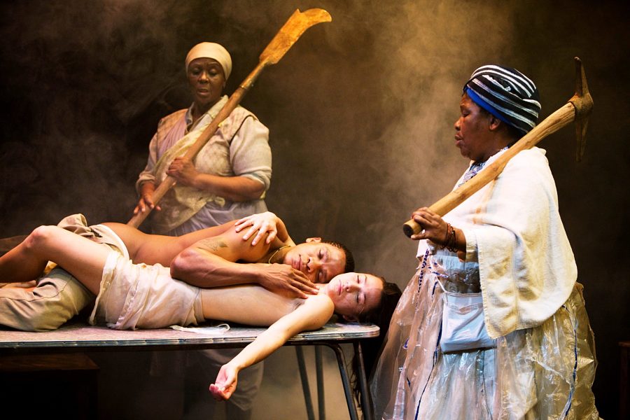 Thoko Ntshinga, Bongile Mantsai, Hilda Cronje, and Tandiwe Nofirst in Yaël  Farber's "Mies Julie," at Shakespeare Theatre in 2013. (Photo by Murdo MacLeod)