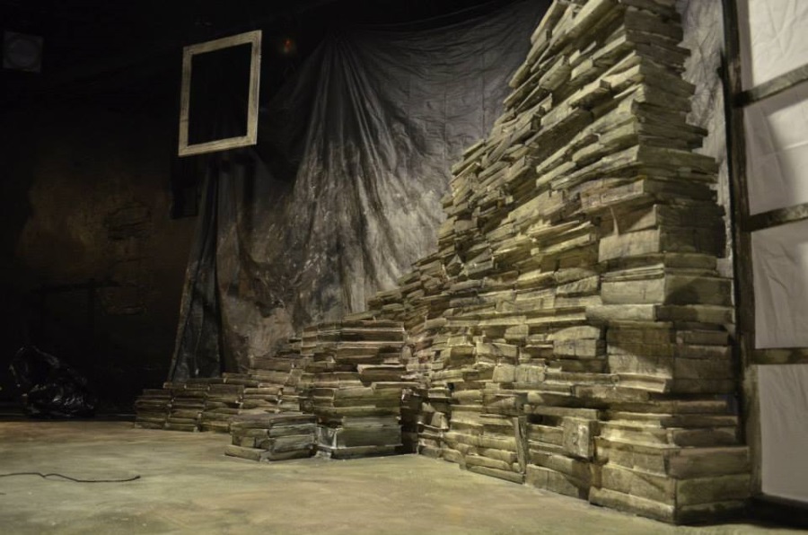 Set Designer Kirk V. Hughes built a set out of books for Ray Bradbury's "Fahrenheit 451" at the Otherworld Theatre.
