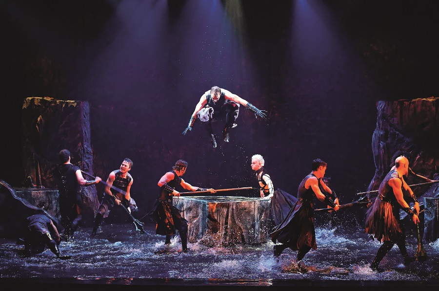 Cunis, midair, in the title role of 'King Arthur,' in fall 2010 at Synetic Theater in Virginia.