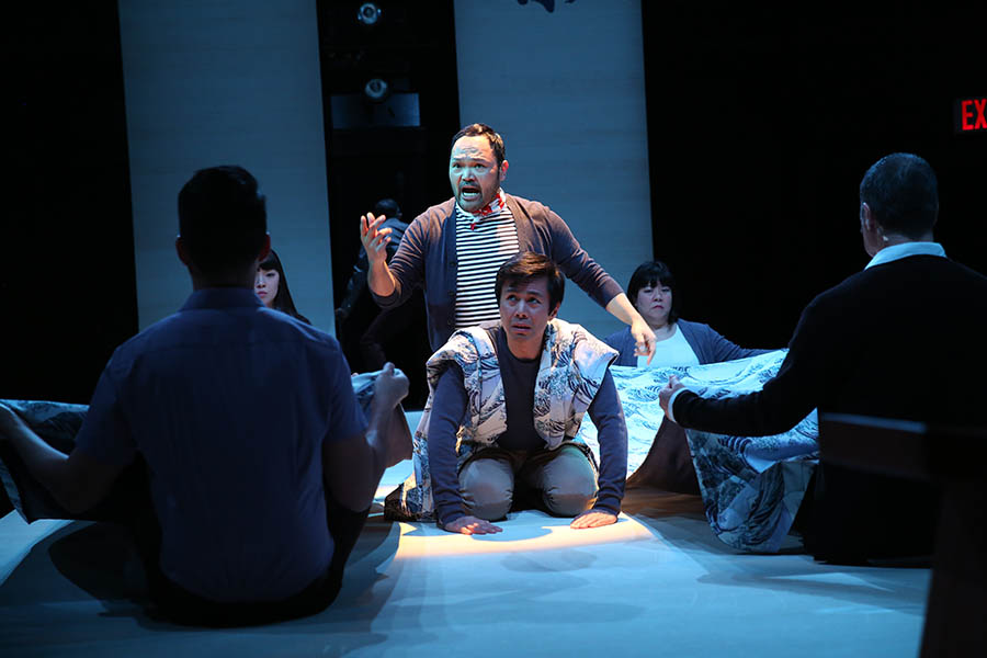 Orville Mendoza and Steven Eng, center, and the cast of "Pacific Overtures" by John Weidman and Stephen Sondheim, at Classic Stage Company. Photo by Joan Marcus