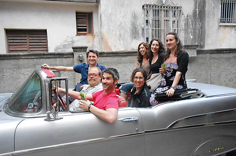 TCG delegation members in Cuban artist Kadir Lopez's car.