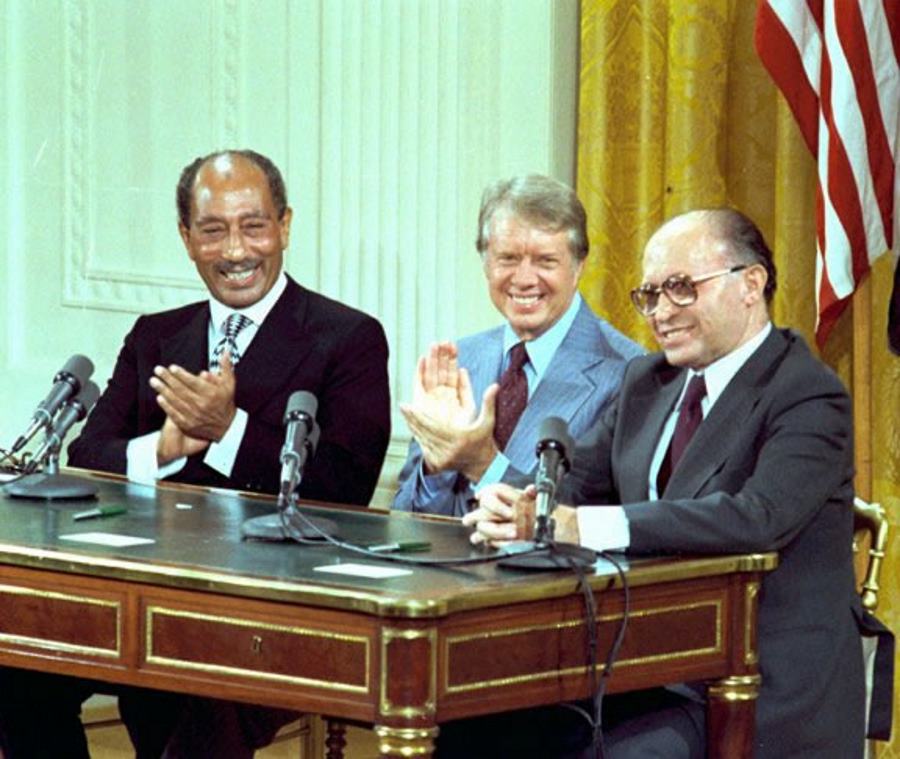 Egyptian President Anwar Sadat, President Jimmy Carter and Israeli Prime Minster Menahem Beginat at the signing of the Camp David Accords on September 17, 1978. (Photo courtesy of the Jimmy Carter Presidential Library)