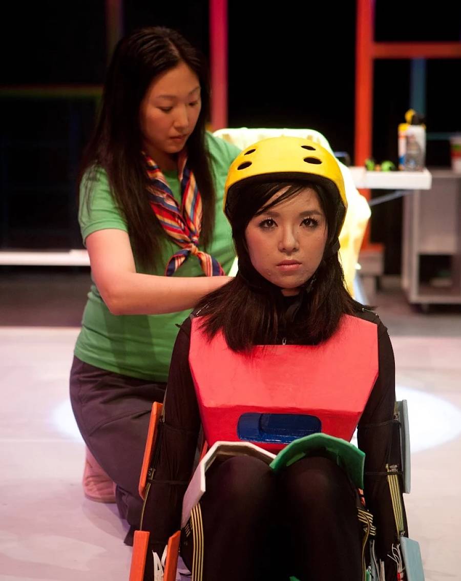 Jennifer Jung and Sayaka Miyatani in Rolin Jones's "The Intelligent Design of Jenny Chow," at Long Beach Playhouse in 2012. (Photo by Jonathan Lewis)