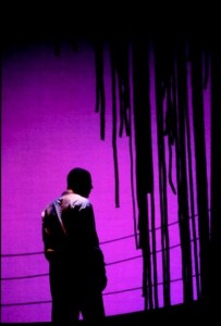 Derrick Lee Weeden framed by Dawn Chiang's lighting in "Les Blancs" at Oregon Shakespeare Festival in 1998.