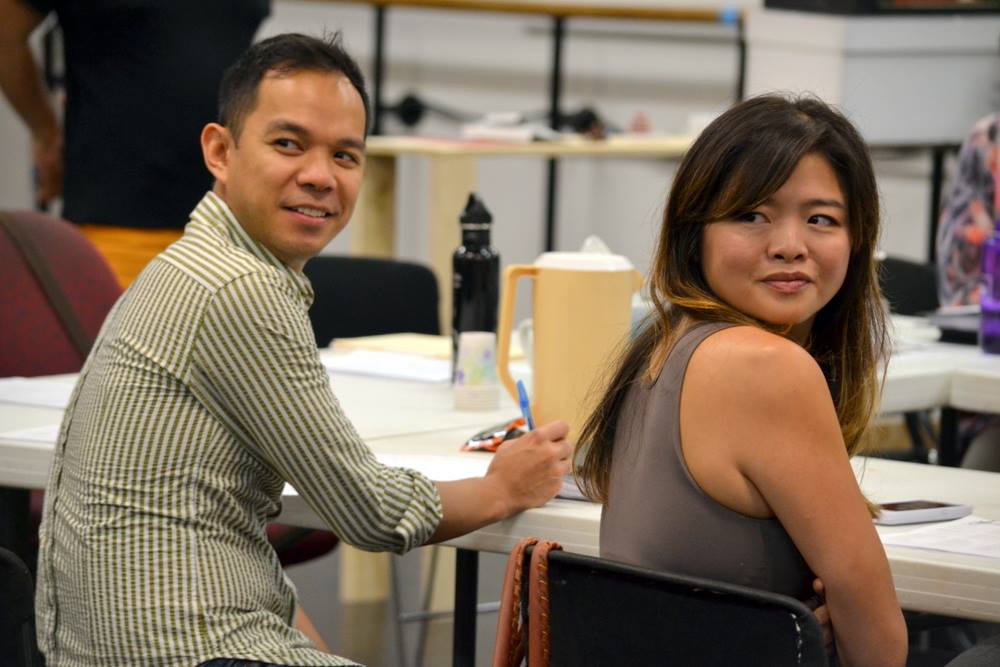 Actors Jon Norman Schneider and Ruibo Qian on the first day of rehearsals for "Tiger Style!" at the Alliance Theatre. (Photo by Kathleen Covington)