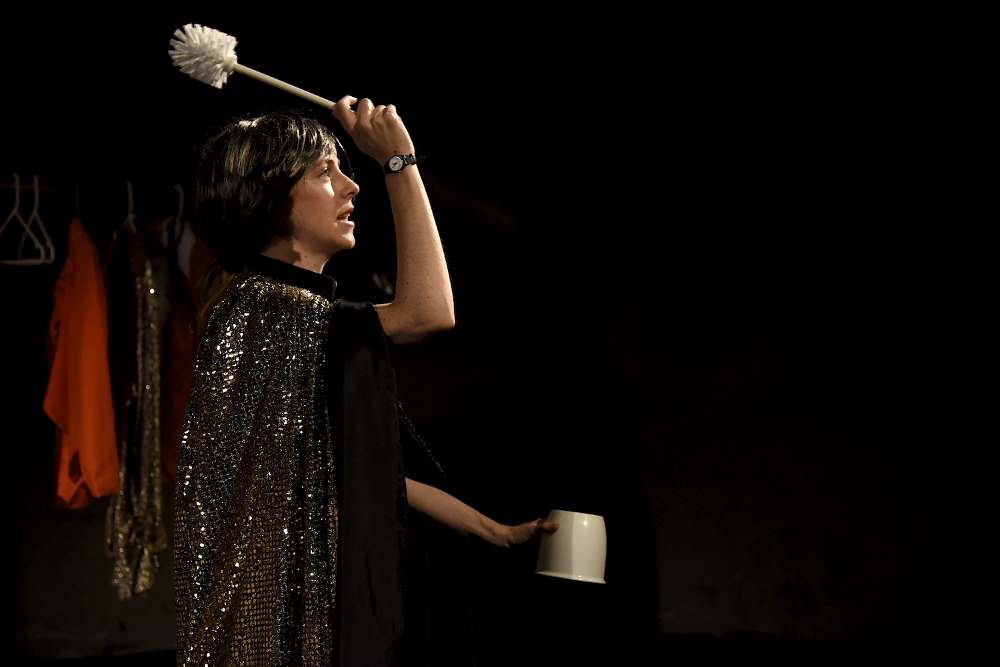 Eliza Bent in "Toilet Fire" at Abrons Arts Center. (Photo by Knud Adams)